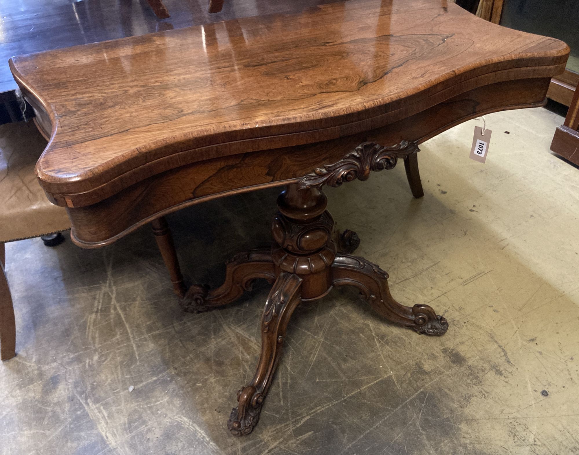 A Victorian rosewood serpentine front folding card table, width 92cm, depth 45cm, height 75cm